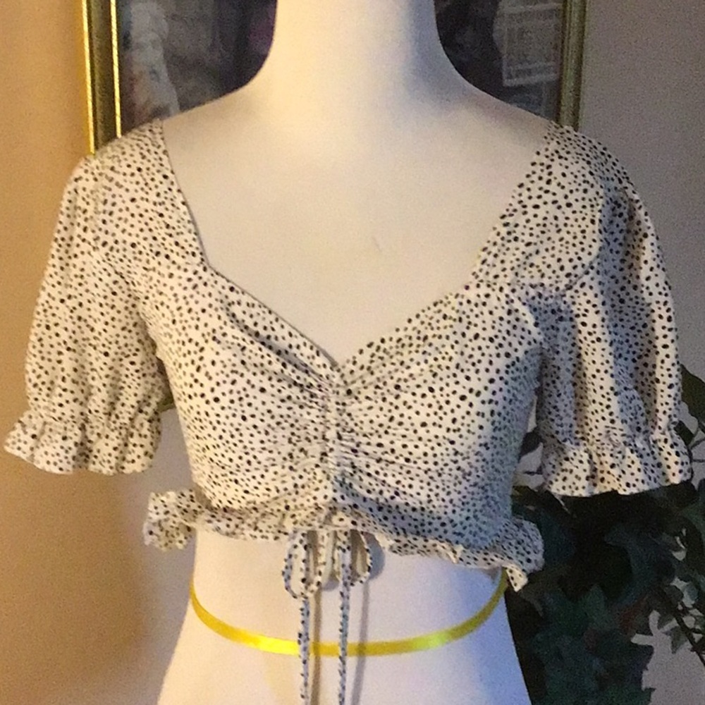 Black and white print, mid drift, short sleeve blouse